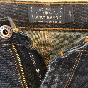 Like new lucky brand dark blue denim jeans